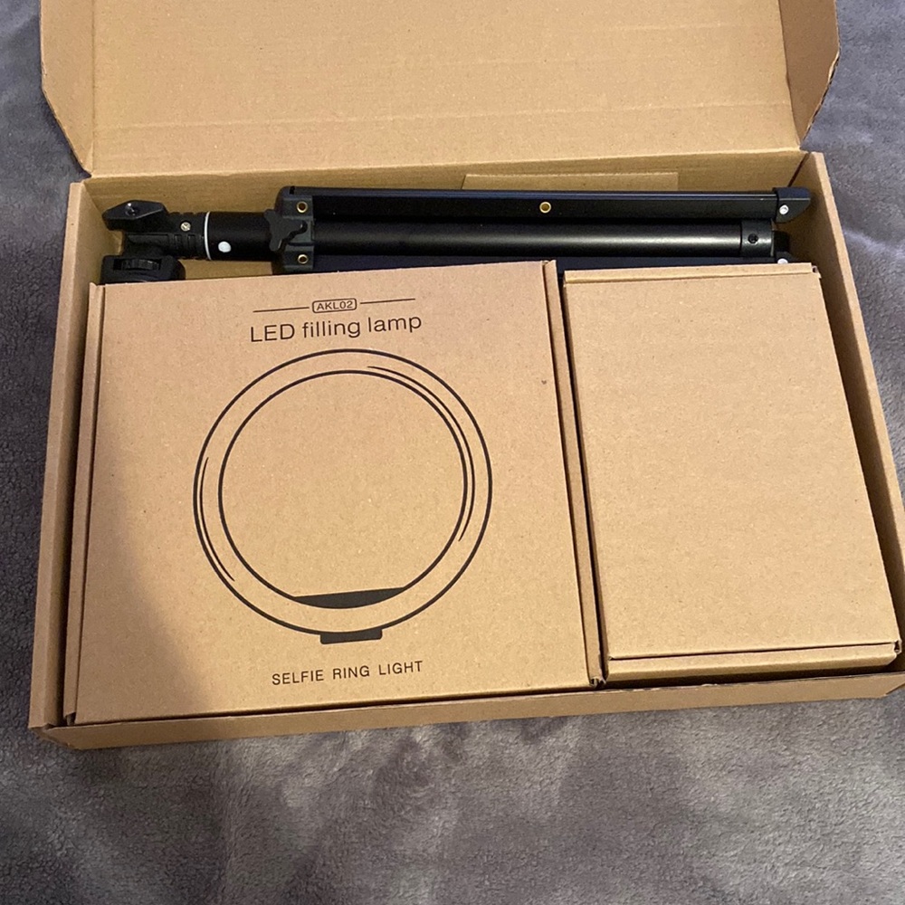 Brand new selfie ring , never used it